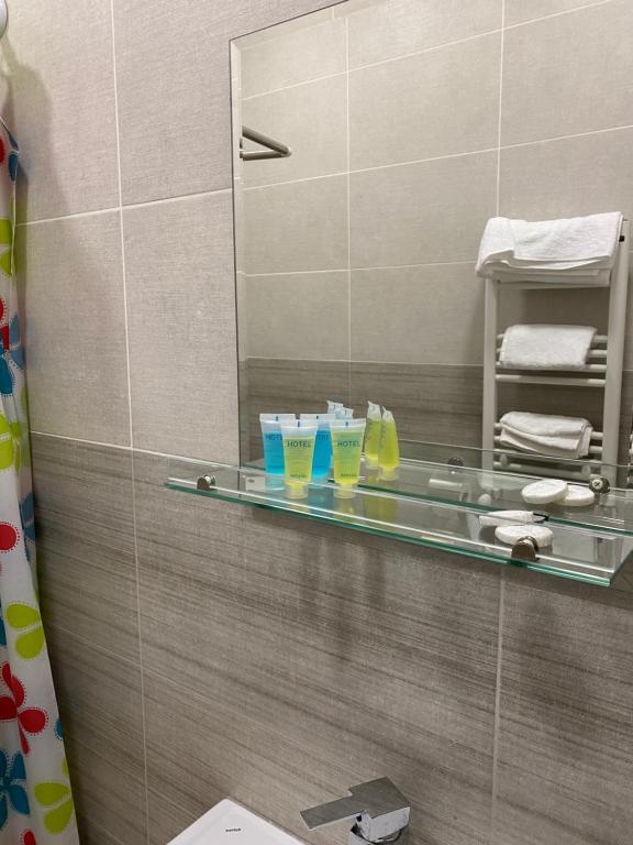 Koupelna v ubytování Hotel Sharl