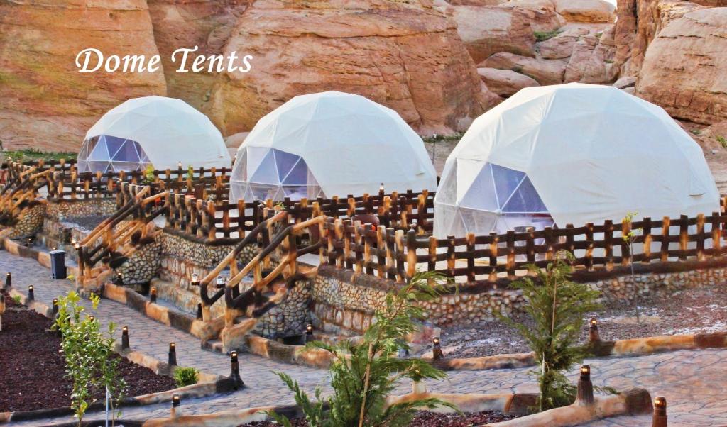 a model of a desert with domes and trees at Seven Wonders Luxury Camp in Wadi Musa