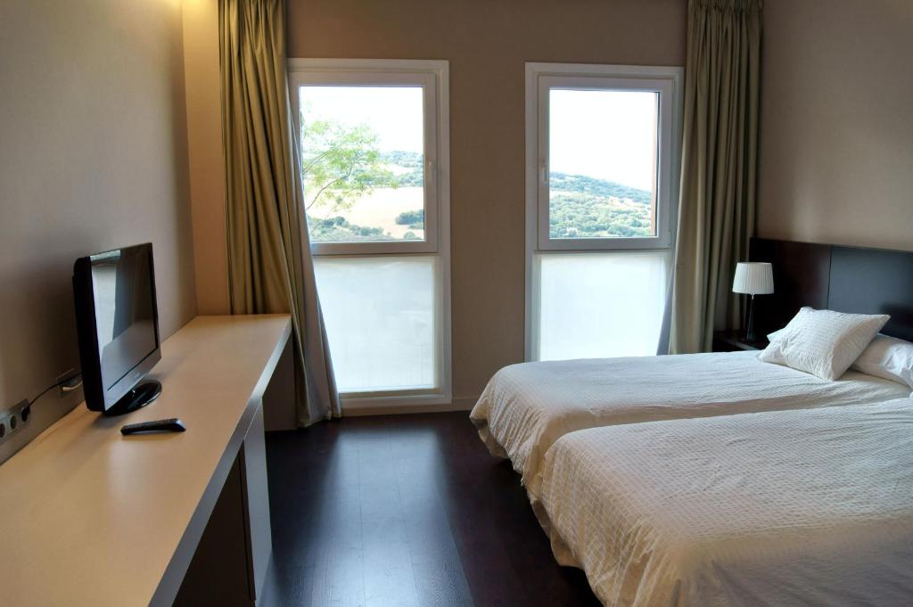 Postel nebo postele na pokoji v ubytování Hotel Rural Valdorba