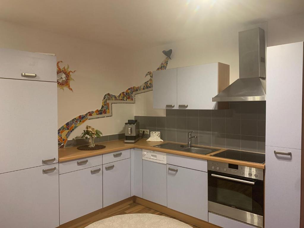 A kitchen or kitchenette at Schilcherland-Apartment