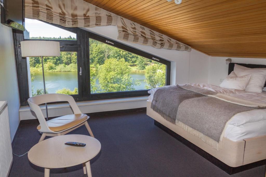 Postel nebo postele na pokoji v ubytování Hotel Njord
