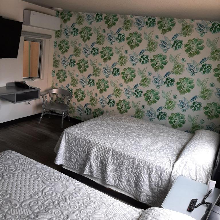 Postel nebo postele na pokoji v ubytování Hotel Kyrios Veracruz