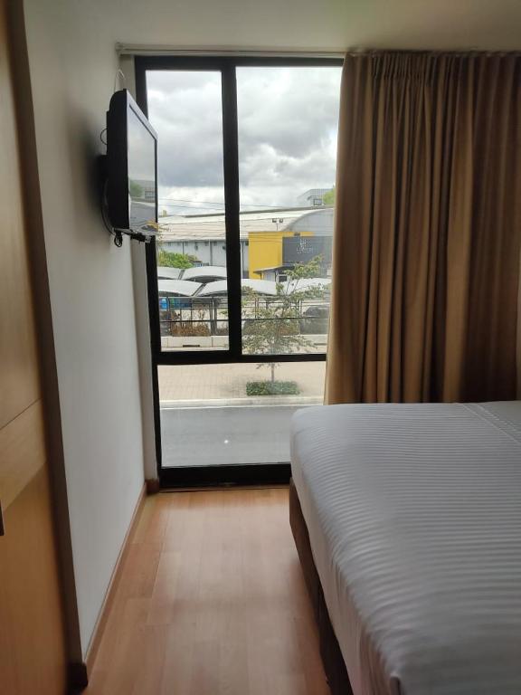 Postel nebo postele na pokoji v ubytování Hotel Dorado Ferial