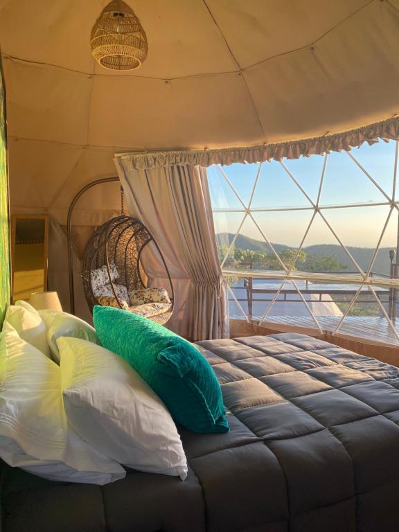 Postel nebo postele na pokoji v ubytování Kintiri Glamping
