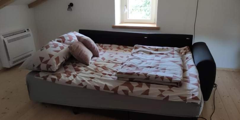 Postel nebo postele na pokoji v ubytování Garden apartment Dena