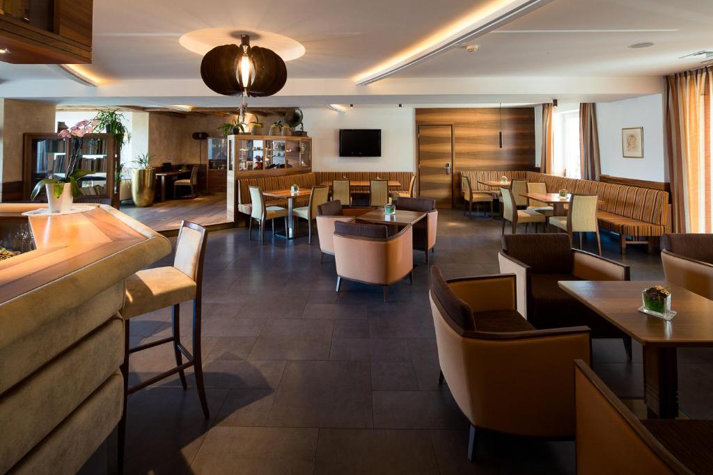 TV a/nebo společenská místnost v ubytování Parc Hotel Tyrol