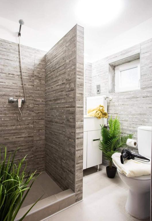 Kúpeľňa v ubytovaní Csigaház Apartman