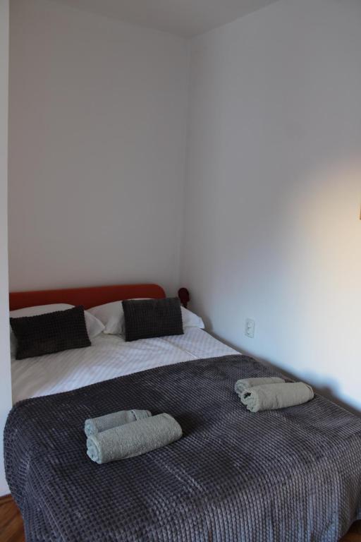 Postel nebo postele na pokoji v ubytování Studio apartman Hinko