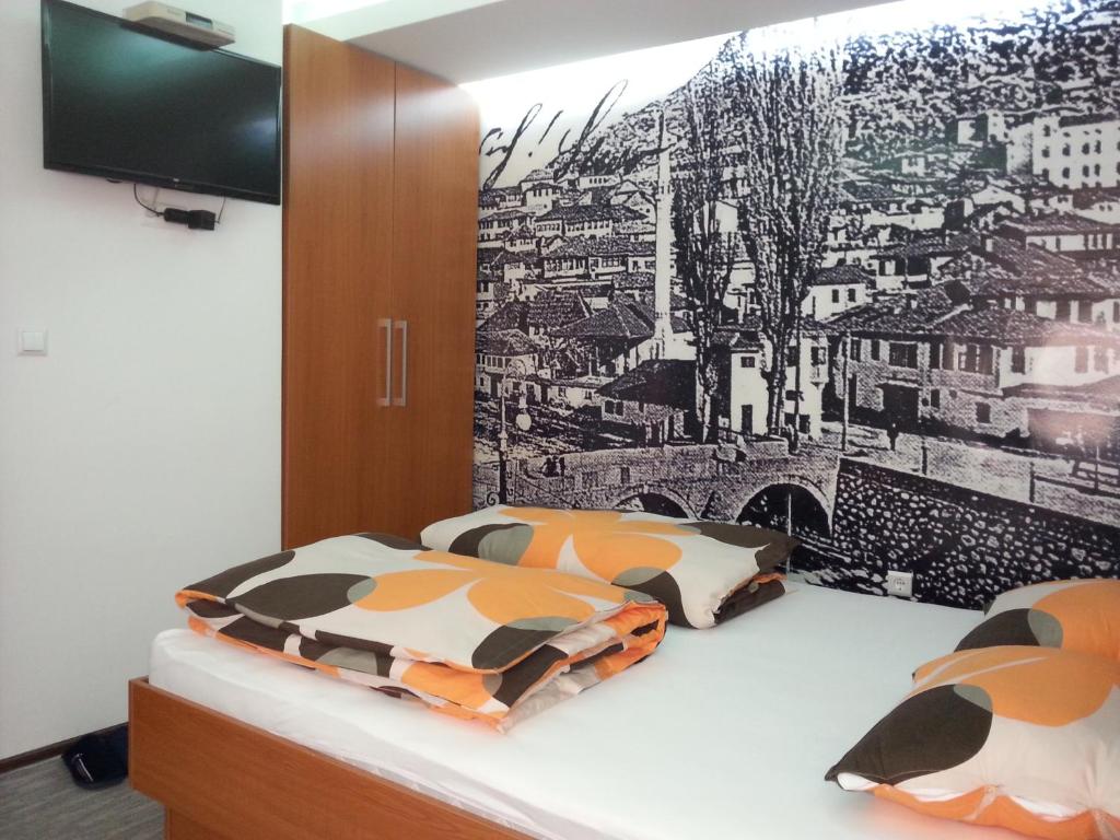 Postel nebo postele na pokoji v ubytování Prenociste Zan