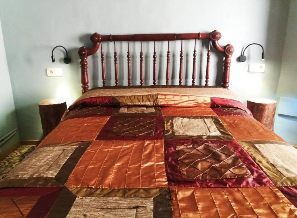 Postel nebo postele na pokoji v ubytování Apartaments Falset