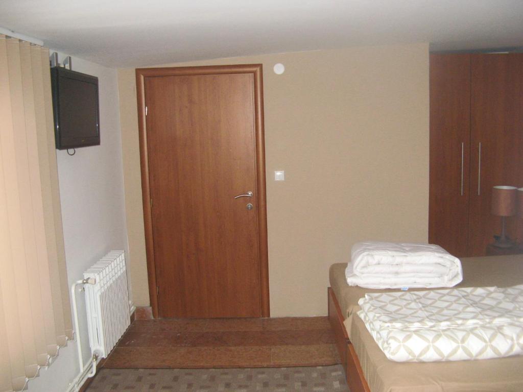 Postel nebo postele na pokoji v ubytování Prenociste Zan