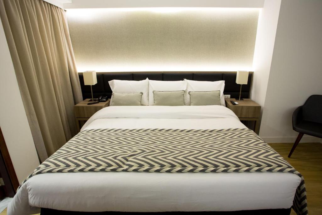Krevet ili kreveti u jedinici u objektu Royal Regency Palace Hotel