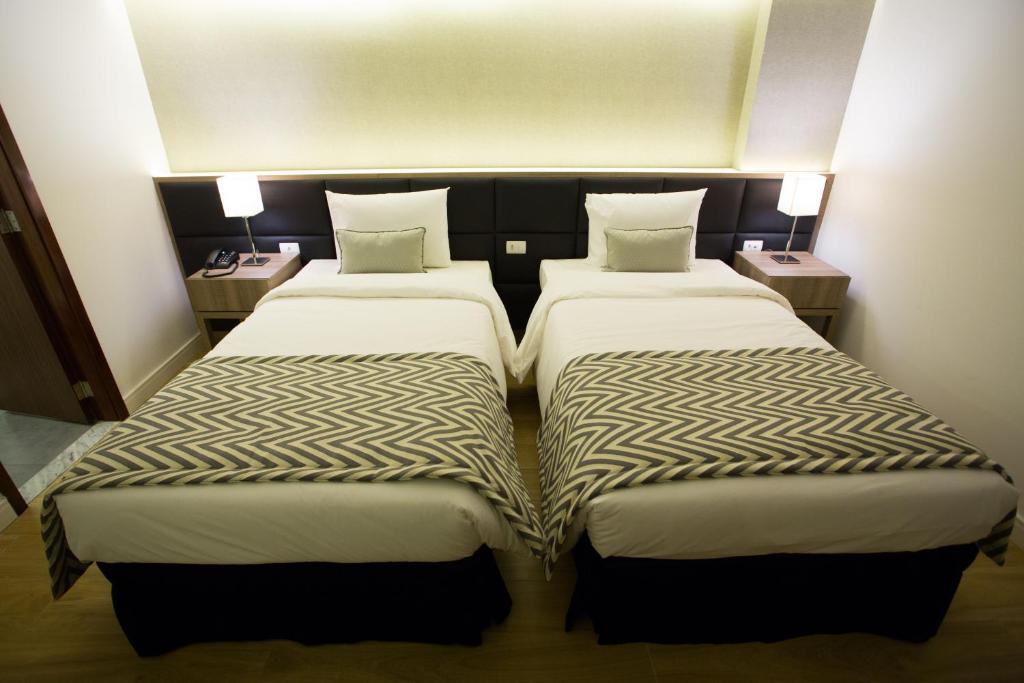 Krevet ili kreveti u jedinici u objektu Royal Regency Palace Hotel