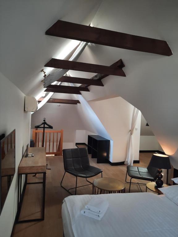 Postel nebo postele na pokoji v ubytování Antik Hotel Prague