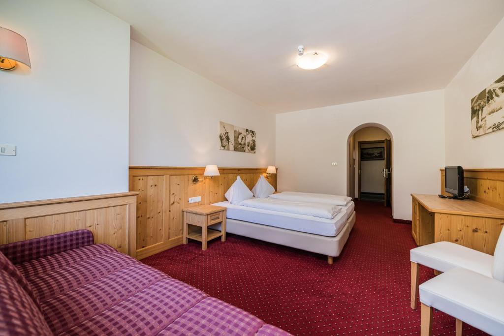 Postel nebo postele na pokoji v ubytování Hotel Waldheim
