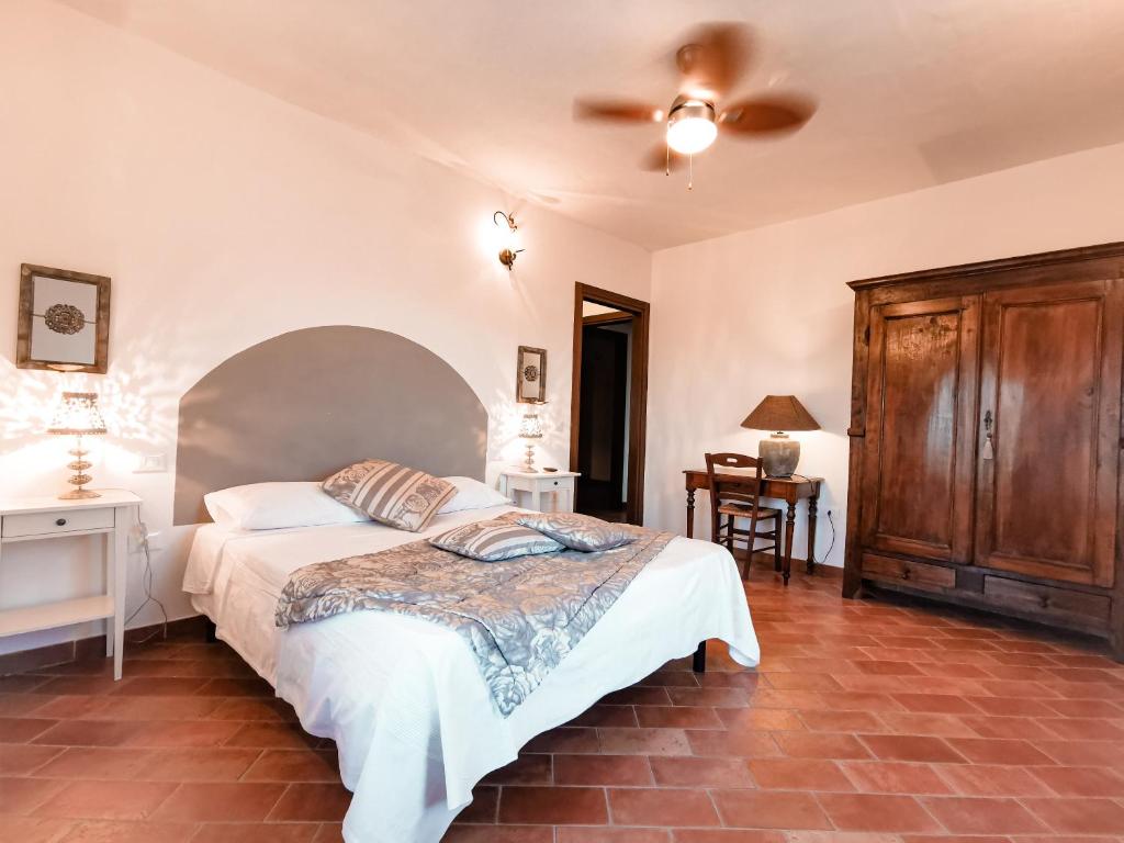 Postel nebo postele na pokoji v ubytování Locanda Acervum