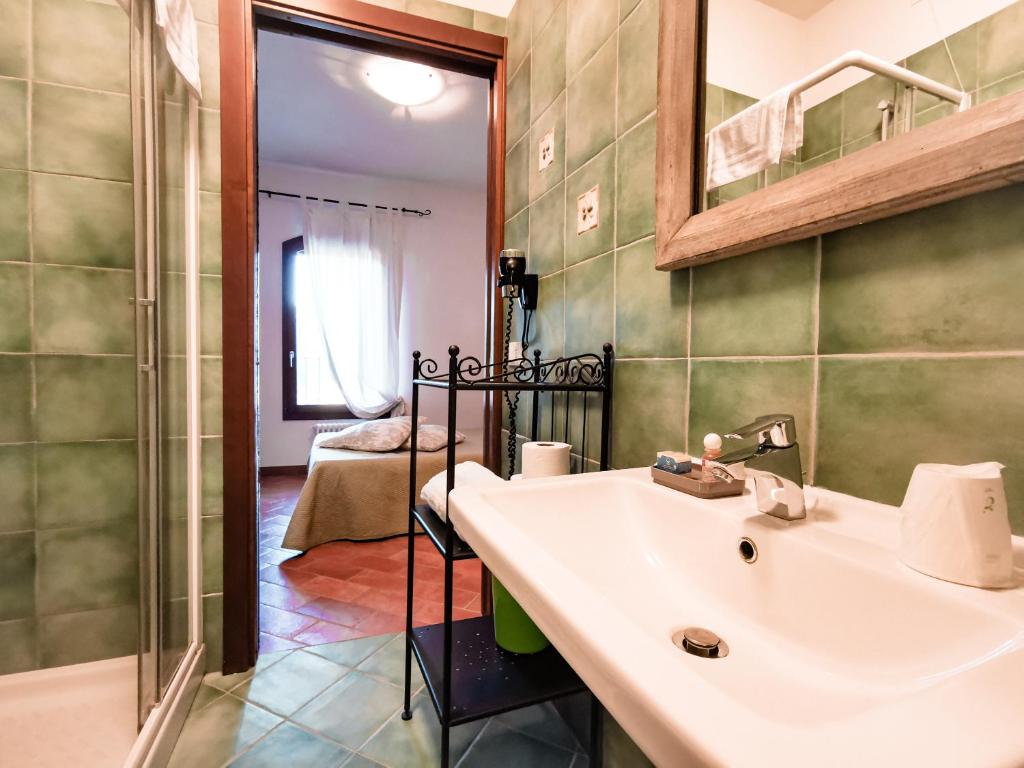Koupelna v ubytování Locanda Acervum