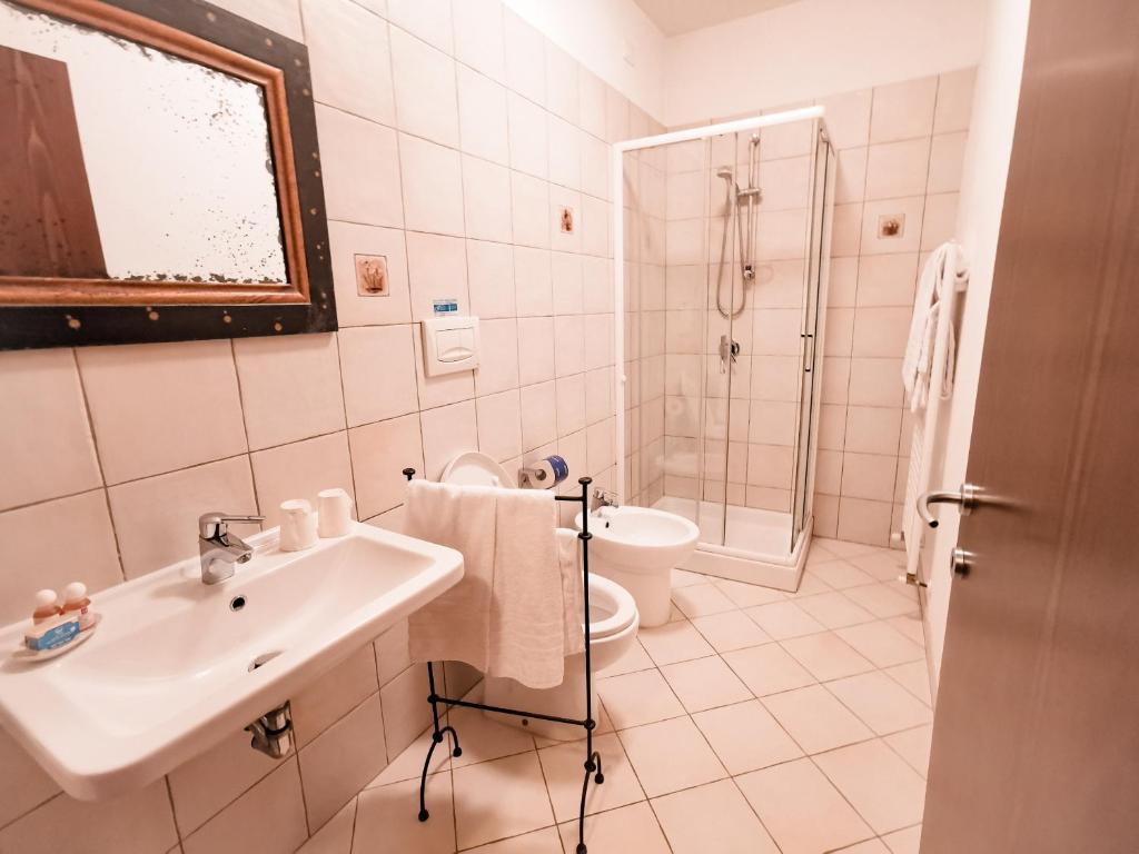 Koupelna v ubytování Locanda Acervum