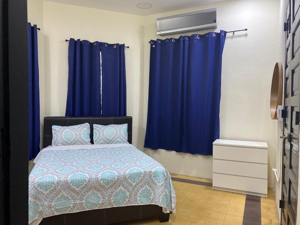 Cama o camas de una habitación en Hostal Mi Rincón
