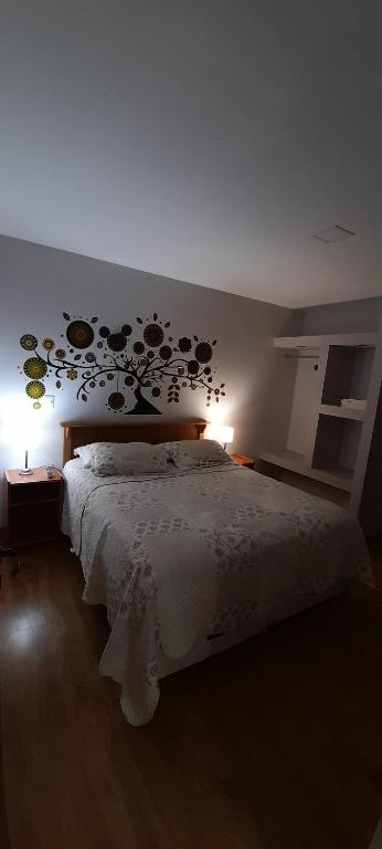 Una cama o camas en una habitación de MViejo