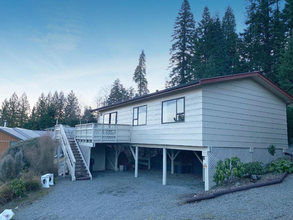 a large house with a staircase on the side of it at 32 Alpine Ave in Hanmer Springs