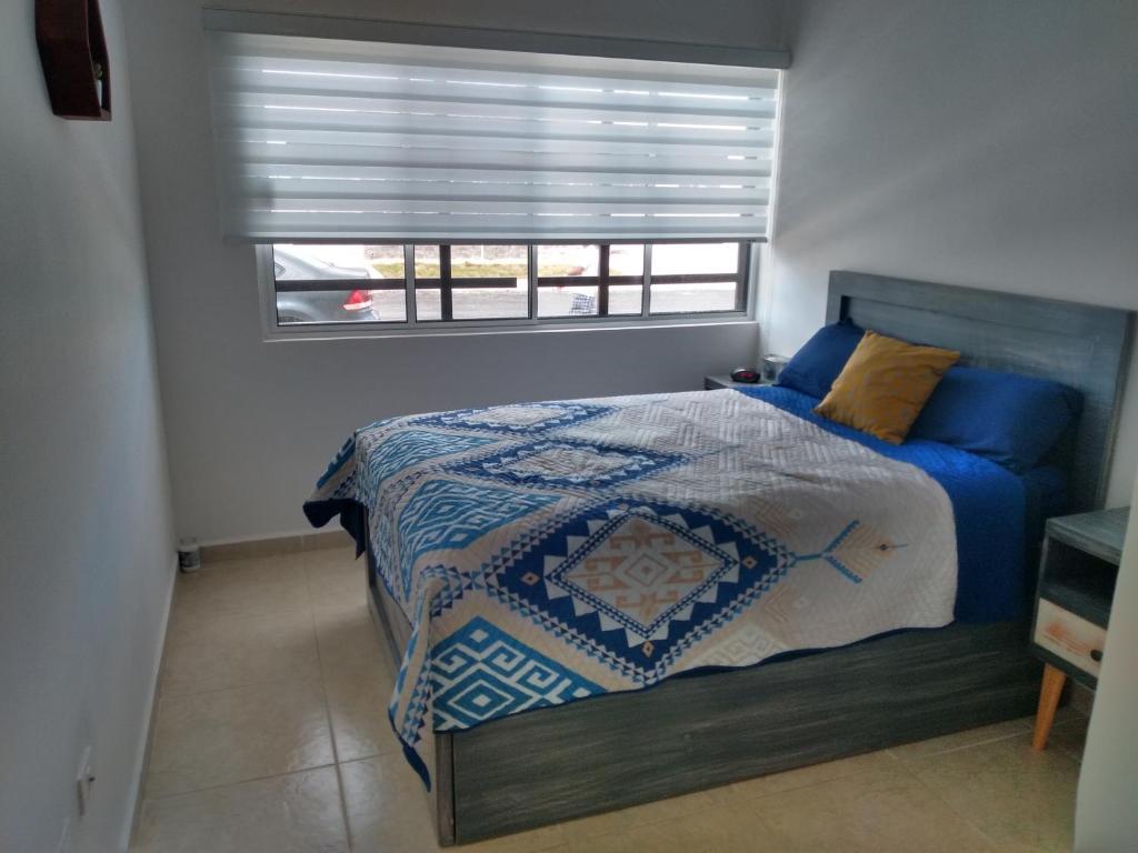 Cama o camas de una habitación en Casa Palejos Cancún