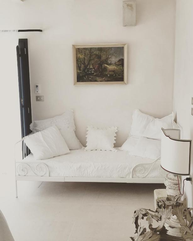 Postel nebo postele na pokoji v ubytování Masseria Prosperi