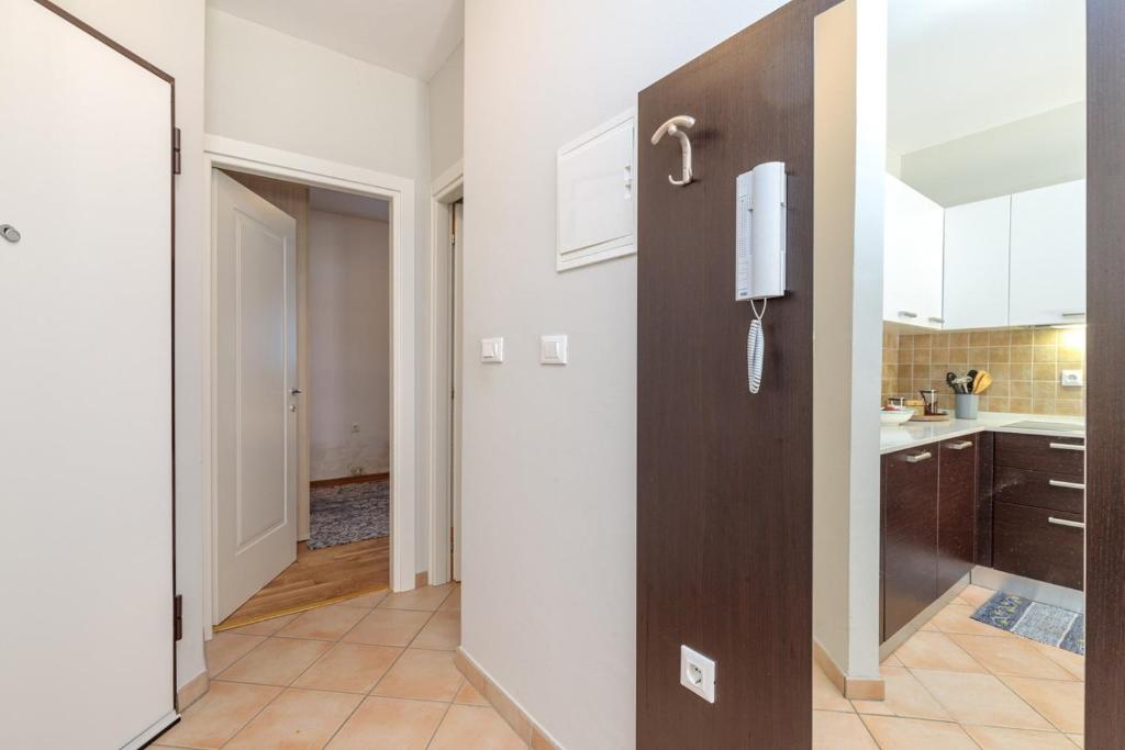 Kuchyň nebo kuchyňský kout v ubytování Apartment Rampin in Gedici