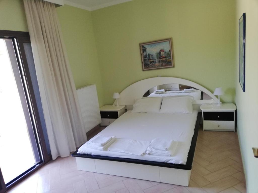 Postel nebo postele na pokoji v ubytování Villa Elva