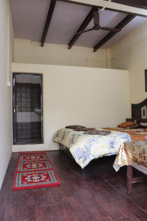 Postel nebo postele na pokoji v ubytování Mother Hostel