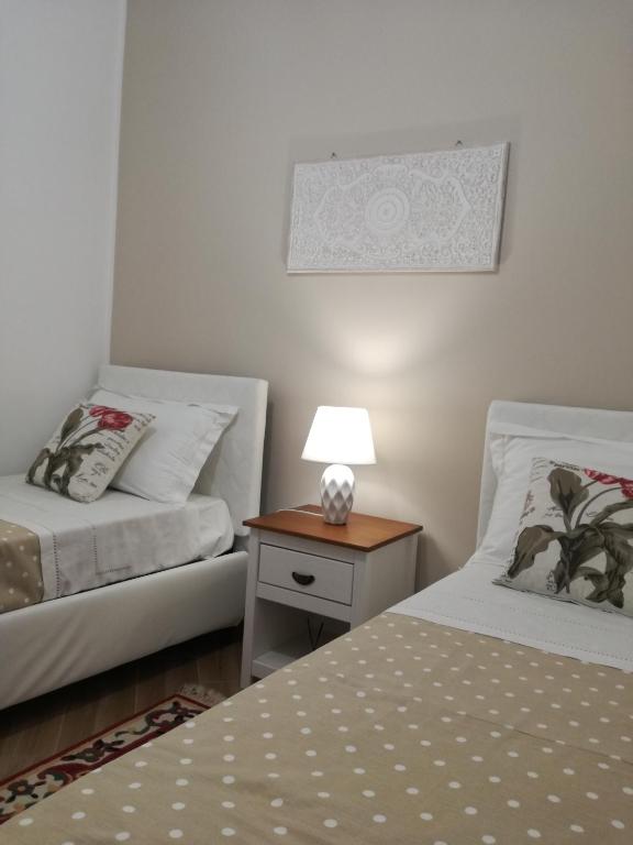 Łóżko lub łóżka w pokoju w obiekcie Terra Sinus Holiday House