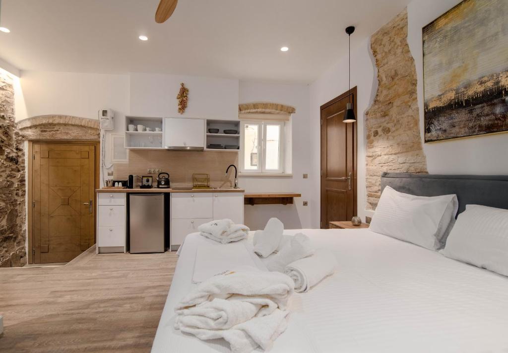 Kuchyňa alebo kuchynka v ubytovaní Curcumelli Luxury Suites - Portoni 1