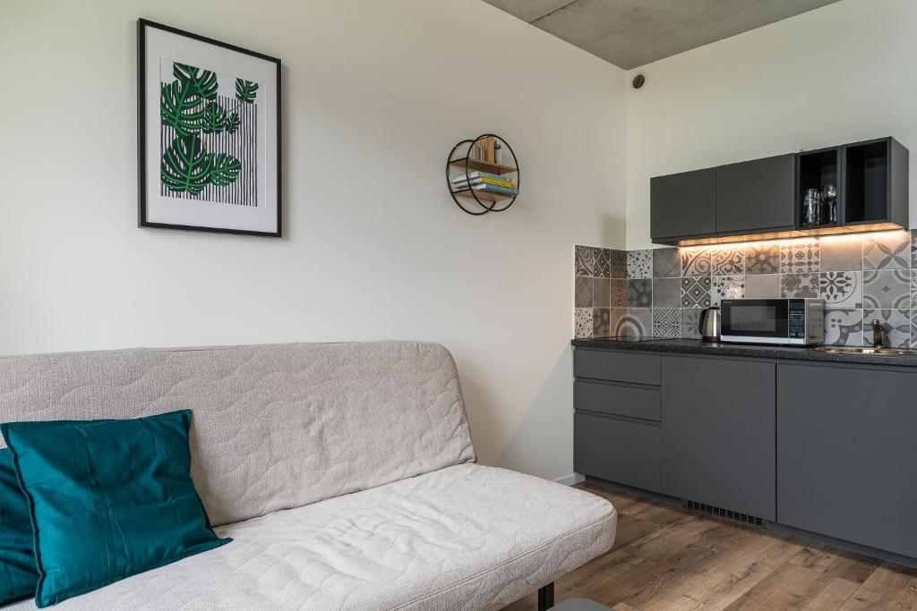 Kuchyňa alebo kuchynka v ubytovaní RentPlanet - Apartamenty Zarembowicza II