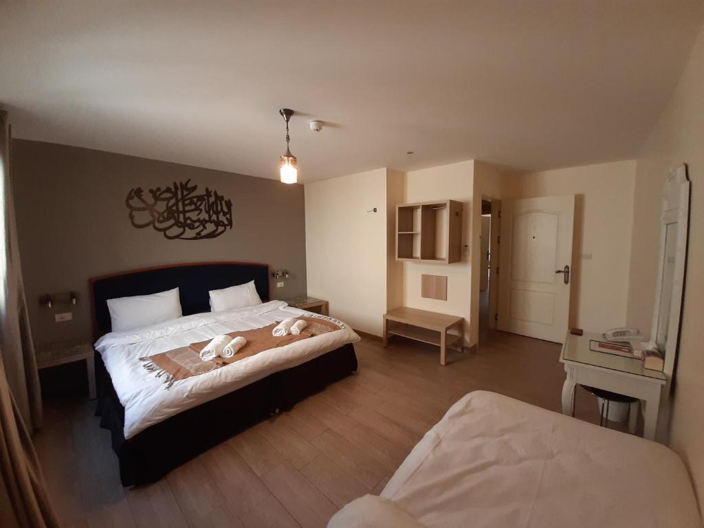 Layaali Amman Hotel - Komfort Dreifachzimmer