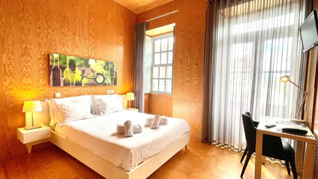 Postel nebo postele na pokoji v ubytování Arc My Otel
