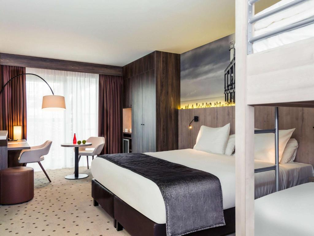 Postel nebo postele na pokoji v ubytování Mercure Blankenberge