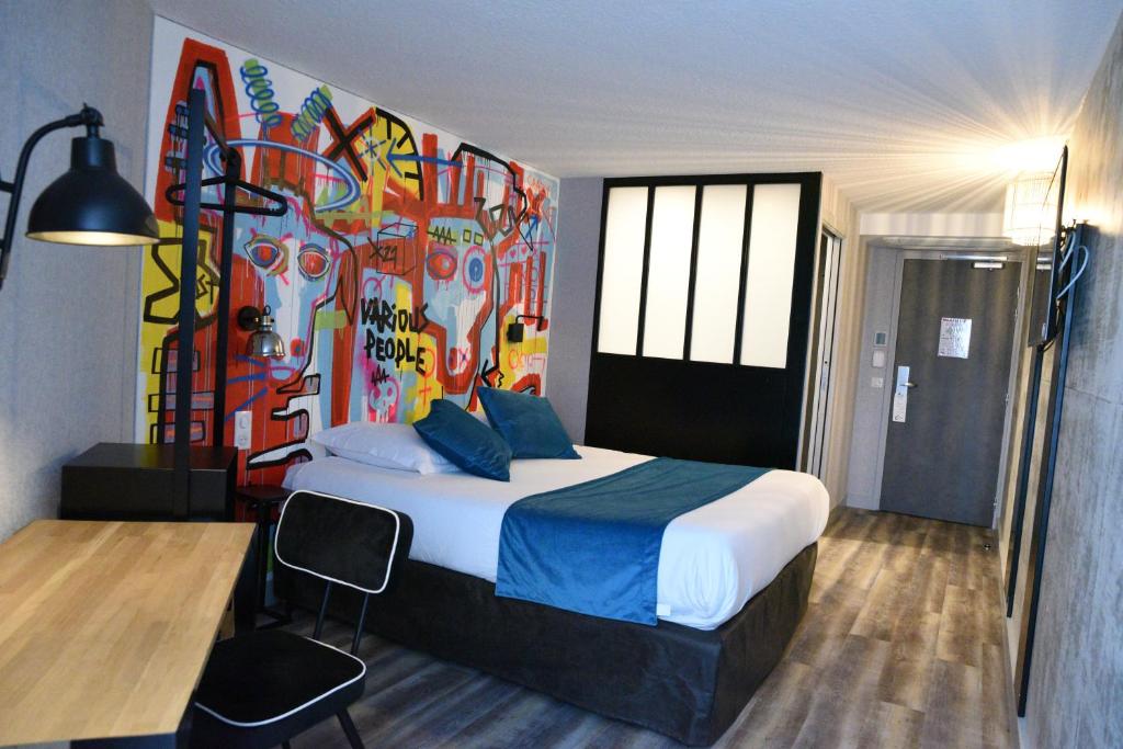 Postel nebo postele na pokoji v ubytování The Originals Boutique, Hôtel Montélimar