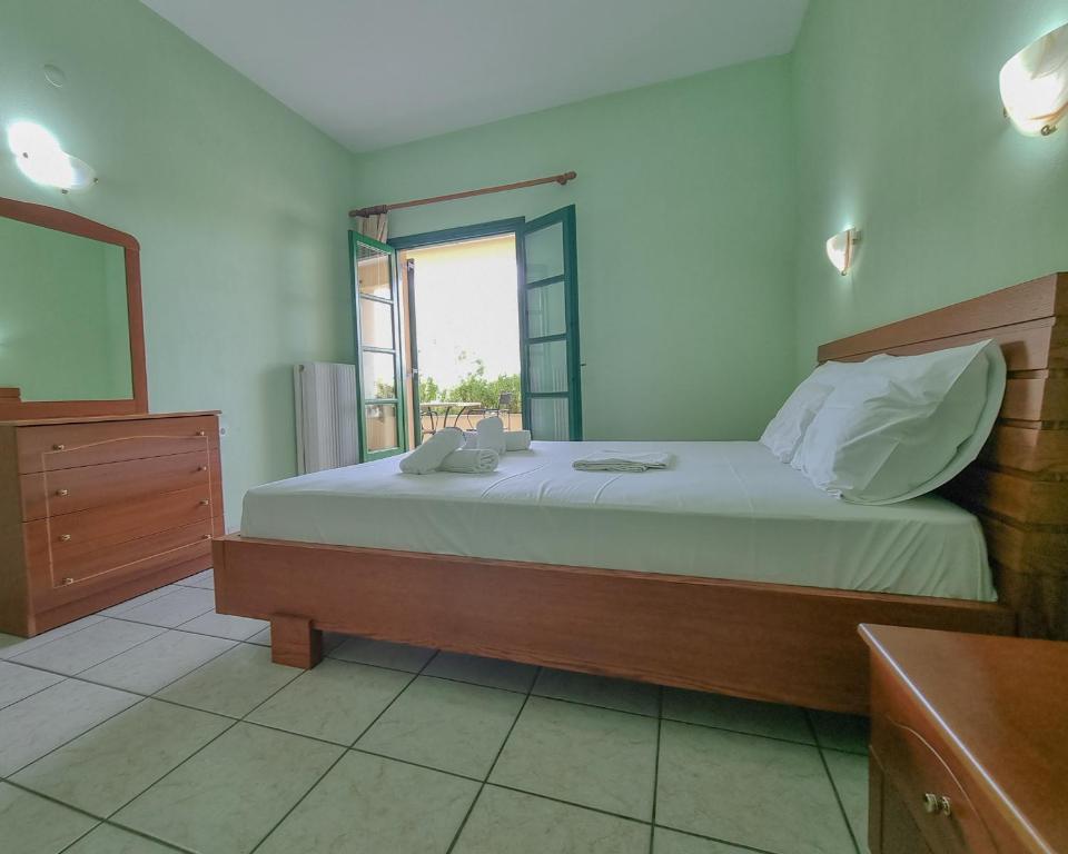 Postel nebo postele na pokoji v ubytování Hotel Spiridoula