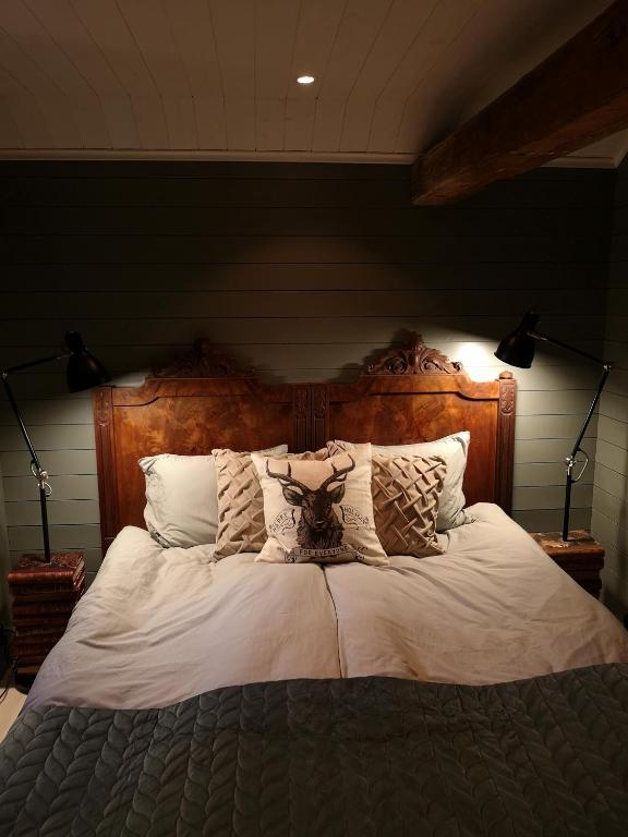 Postel nebo postele na pokoji v ubytování Smedjan cottage