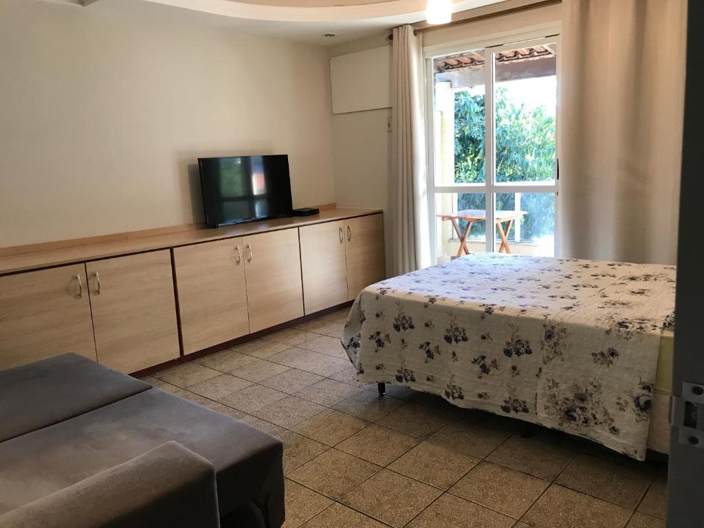 Ένα ή περισσότερα κρεβάτια σε δωμάτιο στο Bento Ferreira Hostel