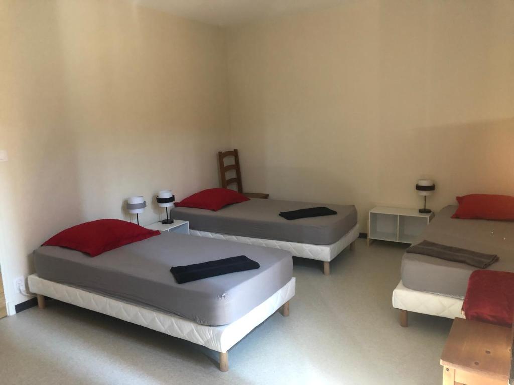 Postel nebo postele na pokoji v ubytování Gîte d'étape Chez François