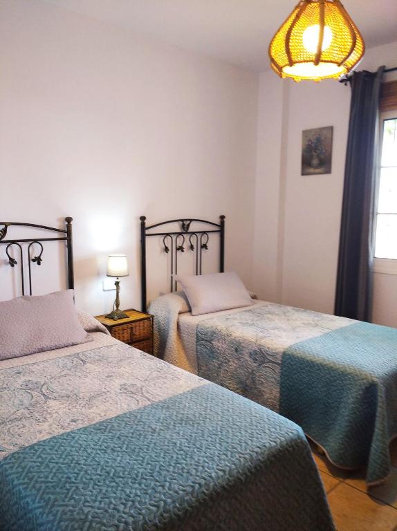 Postel nebo postele na pokoji v ubytování Casa Rural Las Molina