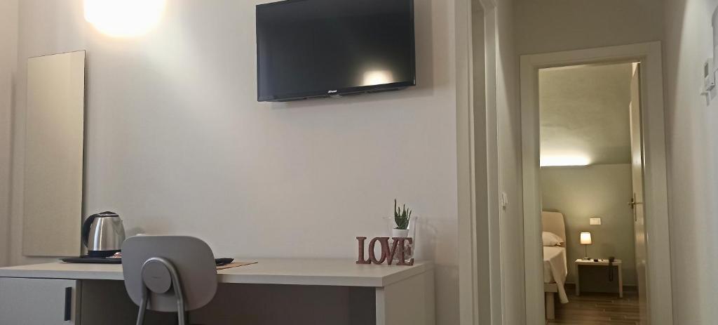 A television and/or entertainment centre at Hotel Cavallo Bianco