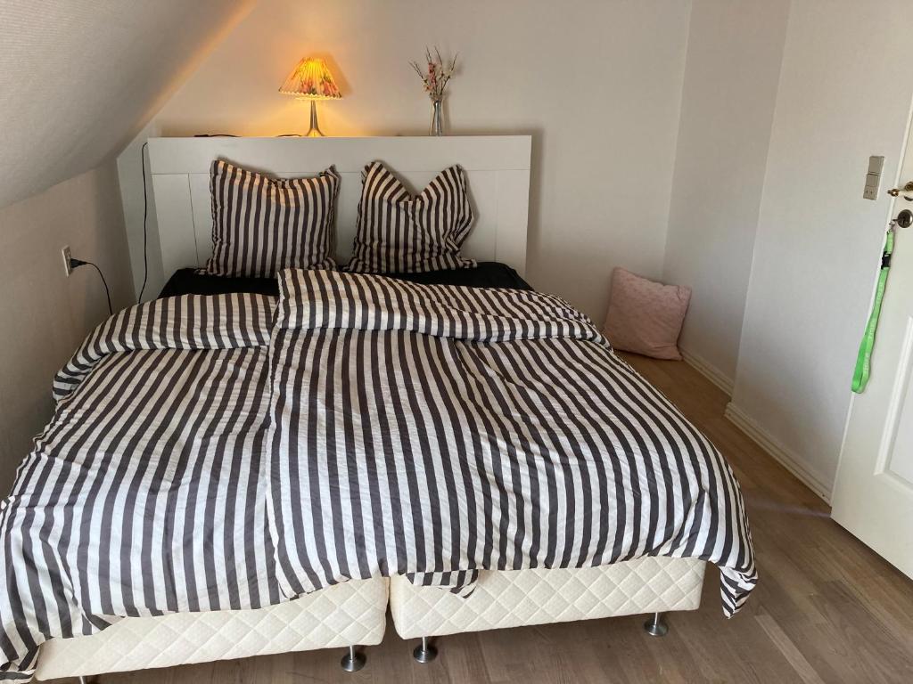 Letto o letti in una camera di Kallerup Hgård