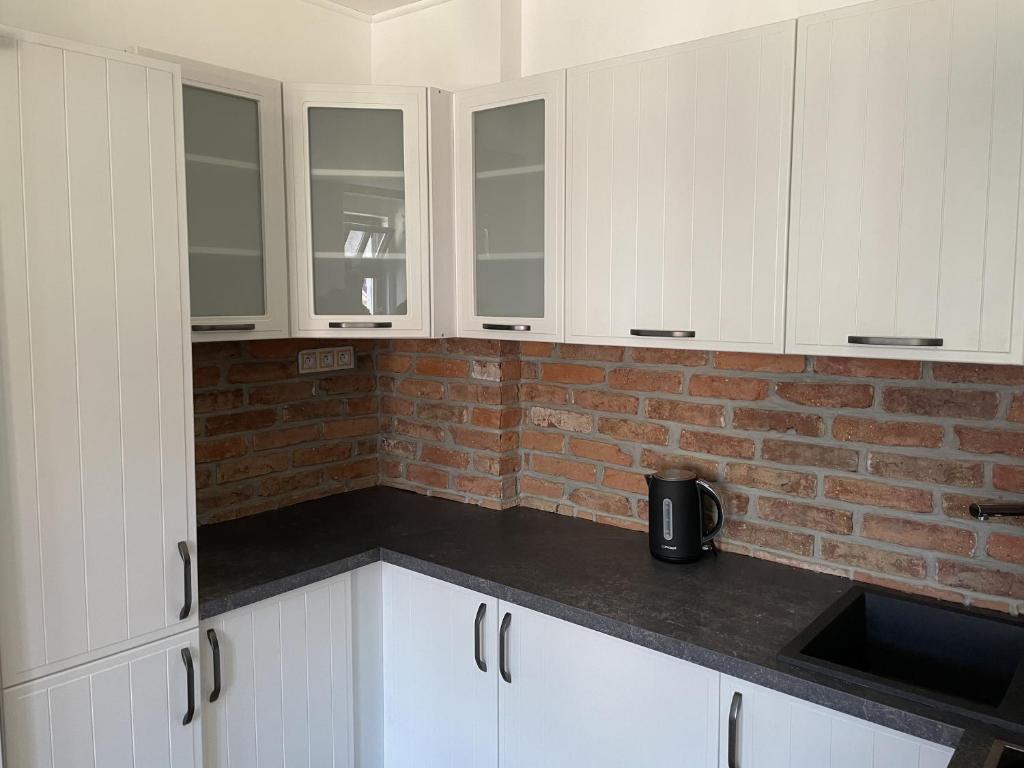 Kuchyň nebo kuchyňský kout v ubytování Apartmány Nejdek
