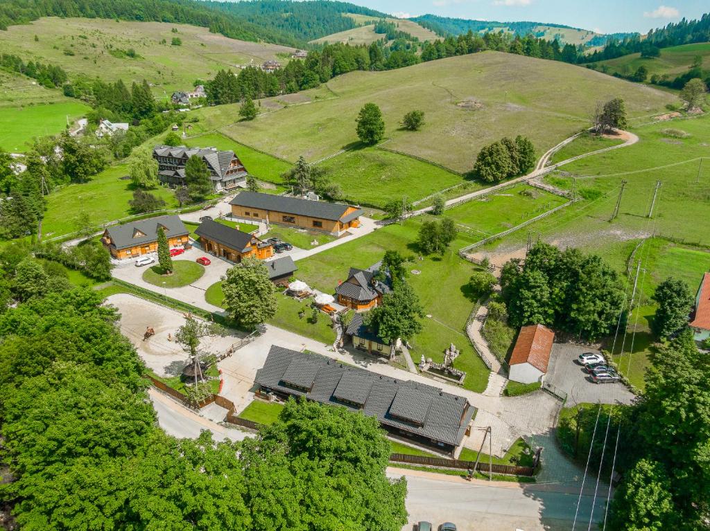 an aerial view of a house on a hill at Apartamenty Rajd Jaworki in Jaworki