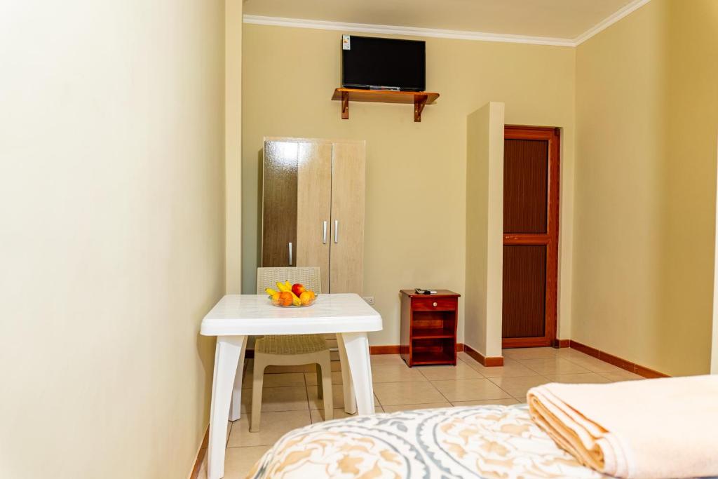 TV a/nebo společenská místnost v ubytování Cucuve Eco Hostal