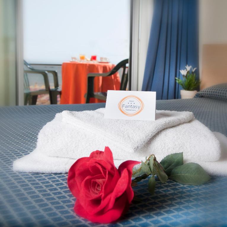 Postel nebo postele na pokoji v ubytování Hotel Fantasy