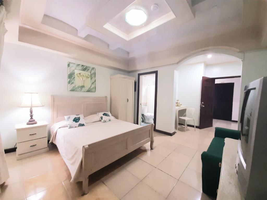 Postel nebo postele na pokoji v ubytování Casa Micarosa Hotel