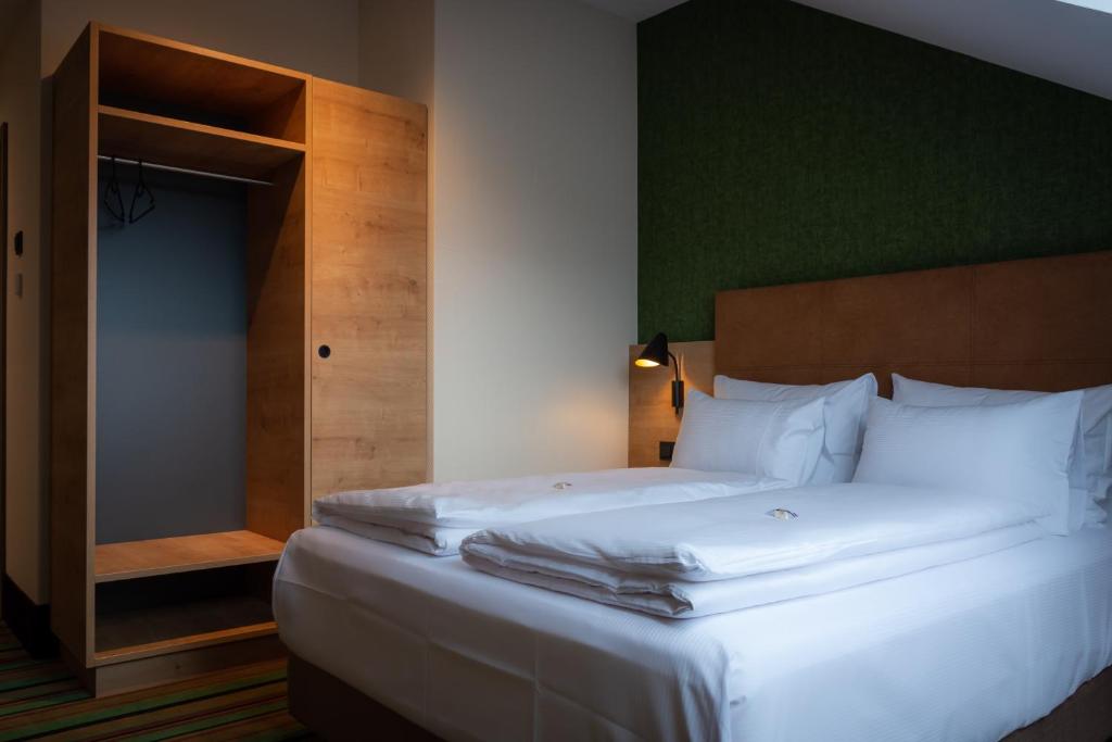 Voodi või voodid majutusasutuse Kb Hotel toas
